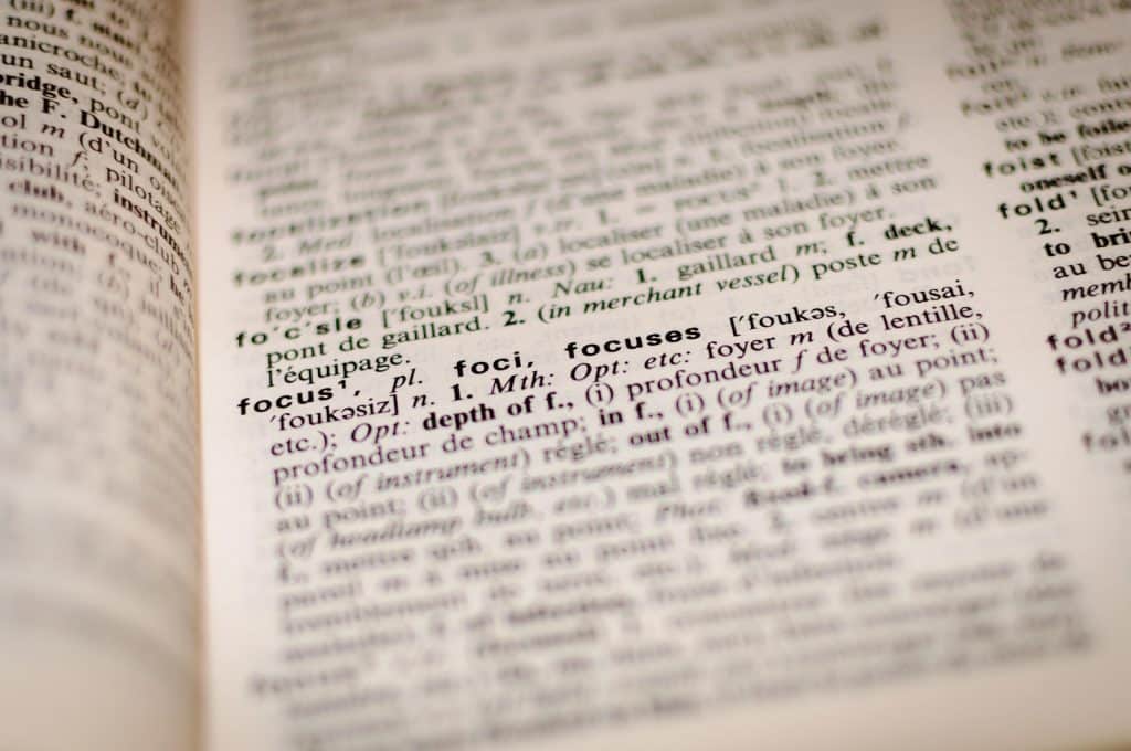 a close-up of a dictionary page for the word "focus" (Photo by Romain Vignes on Unsplash)