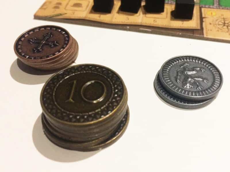 metal coins in Clans of Caledonia
