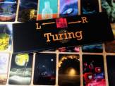 Turing game box and a selection of cards