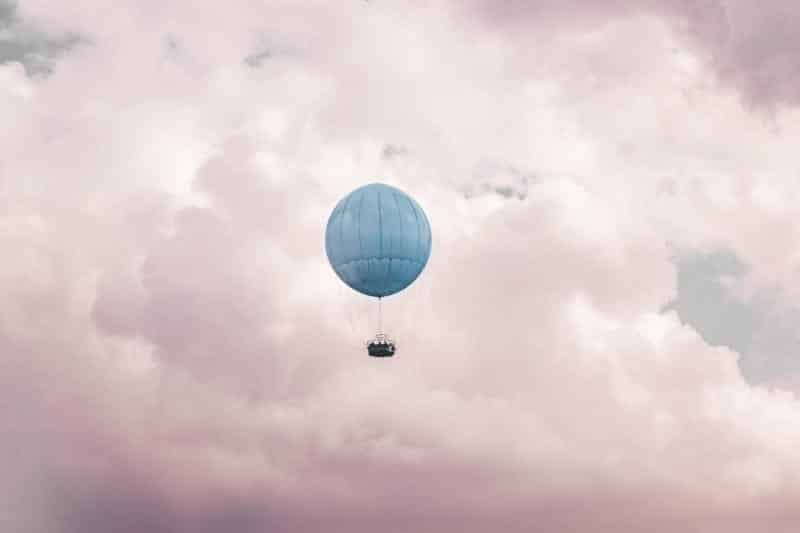 hot air balloon in the sky (Photo by Dzmitry Tselabionak on Unsplash)