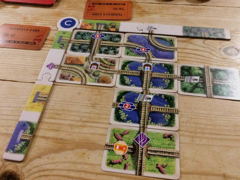 seven track cards and two terminus cards played in Village Rails