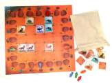 the game board, some of the tiles, arrow tokens and cloth bag from Outback Crossings (photo courtesy of Mücke Spiele)