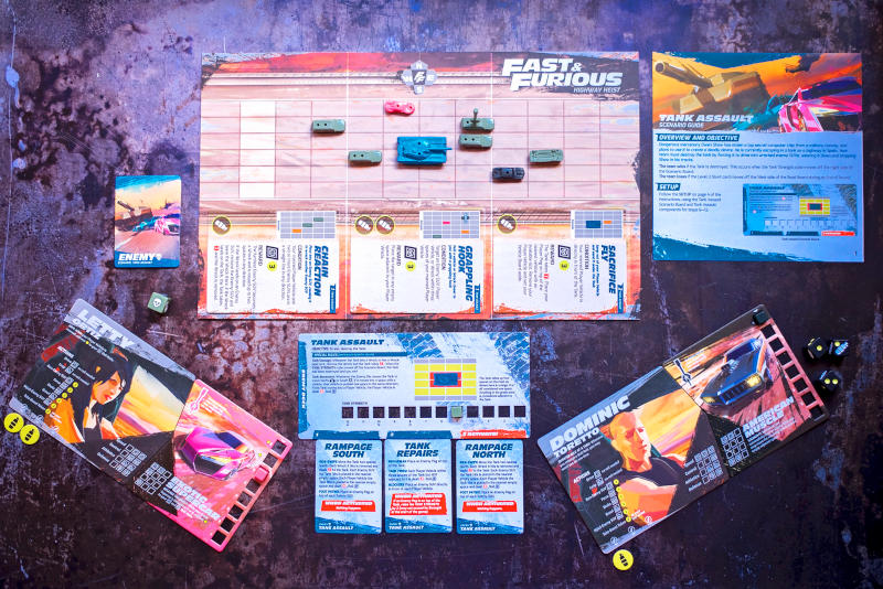 the road board, vehicles, a couple of driver-car combos, some of the cards and more from Fast & Furious: Highway Heist (Photo by Sara-Jayne Jones, keep-up-with-the-jones-family.com)