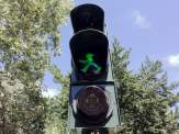 the green man on a Berlin pelican crossing light