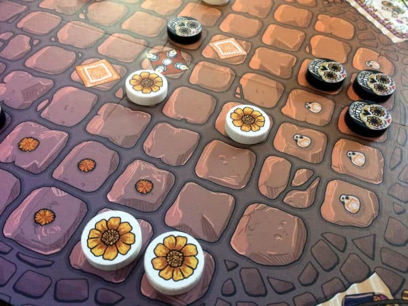 the game board and tokens from ¡Adiós Calavera!