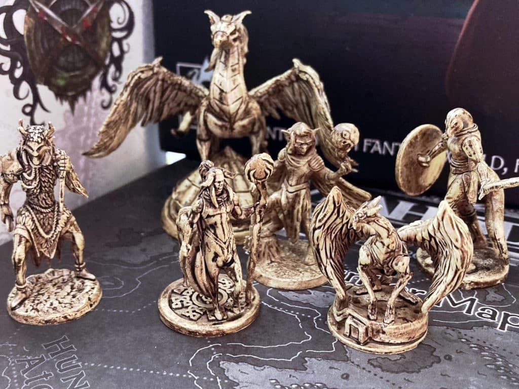 six of the ink-washed plastic miniatures from Vrahode: Age of Prophecy