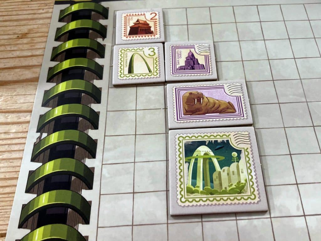 a few stamps arranged on a player's stamp book