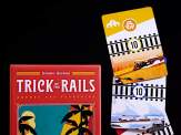 the box cover and a couple of cards from Trick of the Rails