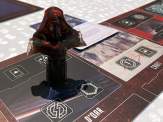 a close-up of the acrylic Kylo Ren character figure on its player board