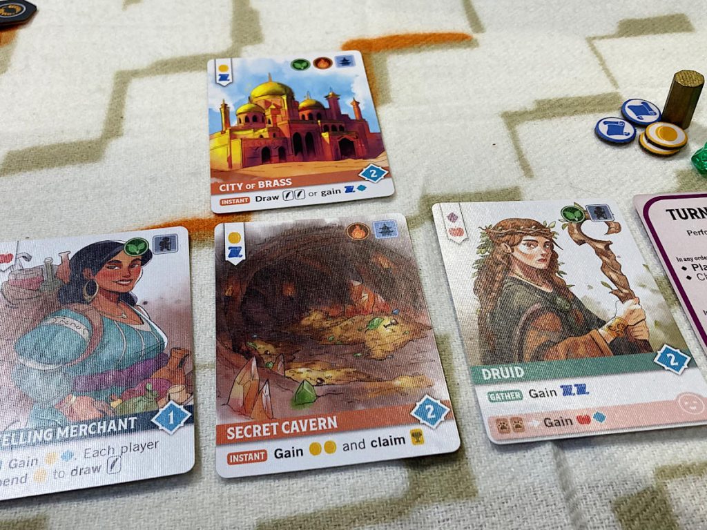 a close-up of some of the cards and prototype components of Smallfolk