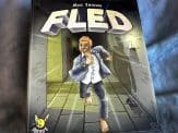 the box cover of Fled