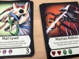 a close-up of two horror cards
