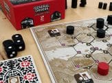 the box of General Orders: Sengoku Jidai, the two dice, a deck of cards, the game board and some of the pieces