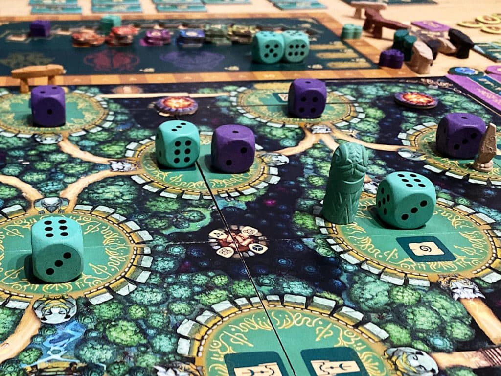 the modular game board, a number of cyan and purple dice and other tokens from The Druids of Edora
